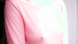 braless bouncing under a pink shirt
