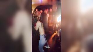 She shows her boobs in a club