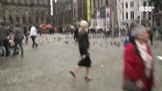 Streaking busy Amsterdam square