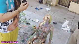Rainbow haired model Sprinkles gets a double frosting facial