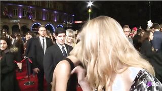 Natalie Dormer & Jennifer Lawrence sharing a kiss on the red carpet
