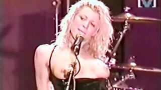 Courtney Love rocking out with her tits out