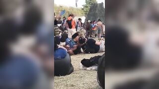 Slutty girl gets her ass ate in public festival by two guys