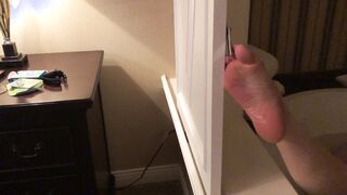 Foot closing a door from a bathtub. No socks on. ;)