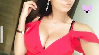 You gotta love the red dress with a lot of cleavage (GIF)