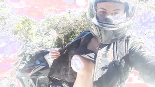 Gorgeous biker shows off her body at a scenic lookout [GIF]