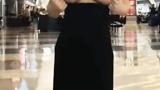 Revealing from a long black dress in public
