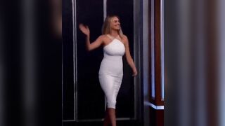 Kate Upton in a tight white dress