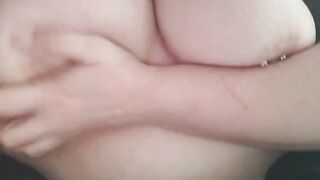 Laying in bed playing with my tits