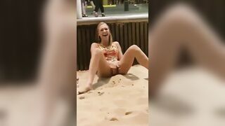 Blonde Publicly Masturbates On The Beach