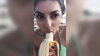 Darcie Dolce sucking on a banana