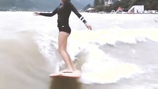 Soyu showing off her legs while surfing