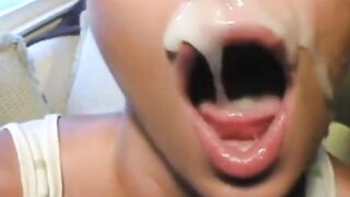 Cumslut plays with thick facial