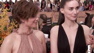 Rooney Mara with a little bit of boob envy checking out sister Kate Mara