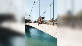 Impressive backflip into the water while hanging