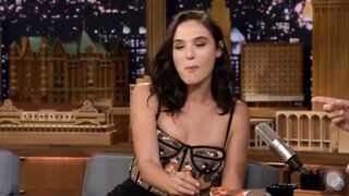Gal Gadot eating a Reese’s PB Cup for the first time.
