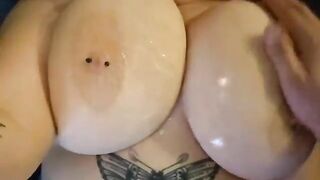 Oiling my huge tits
