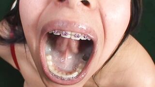 Katalina Linda showing off with a mouth full of cum
