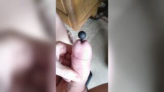Playing with a silicone plug in my hard uncut cock