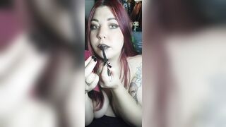 Watch me do my black lips