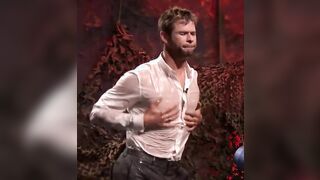 Chris Hemsworth sprayed with water (slow-mo)