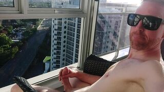 Stroking on the balcony