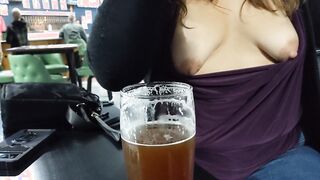 Tits out inside the bar