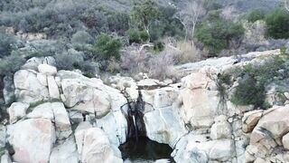 Drone shot of me doing my naked yoga on the water falls [f]